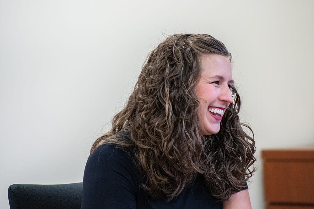 A woman smiling
